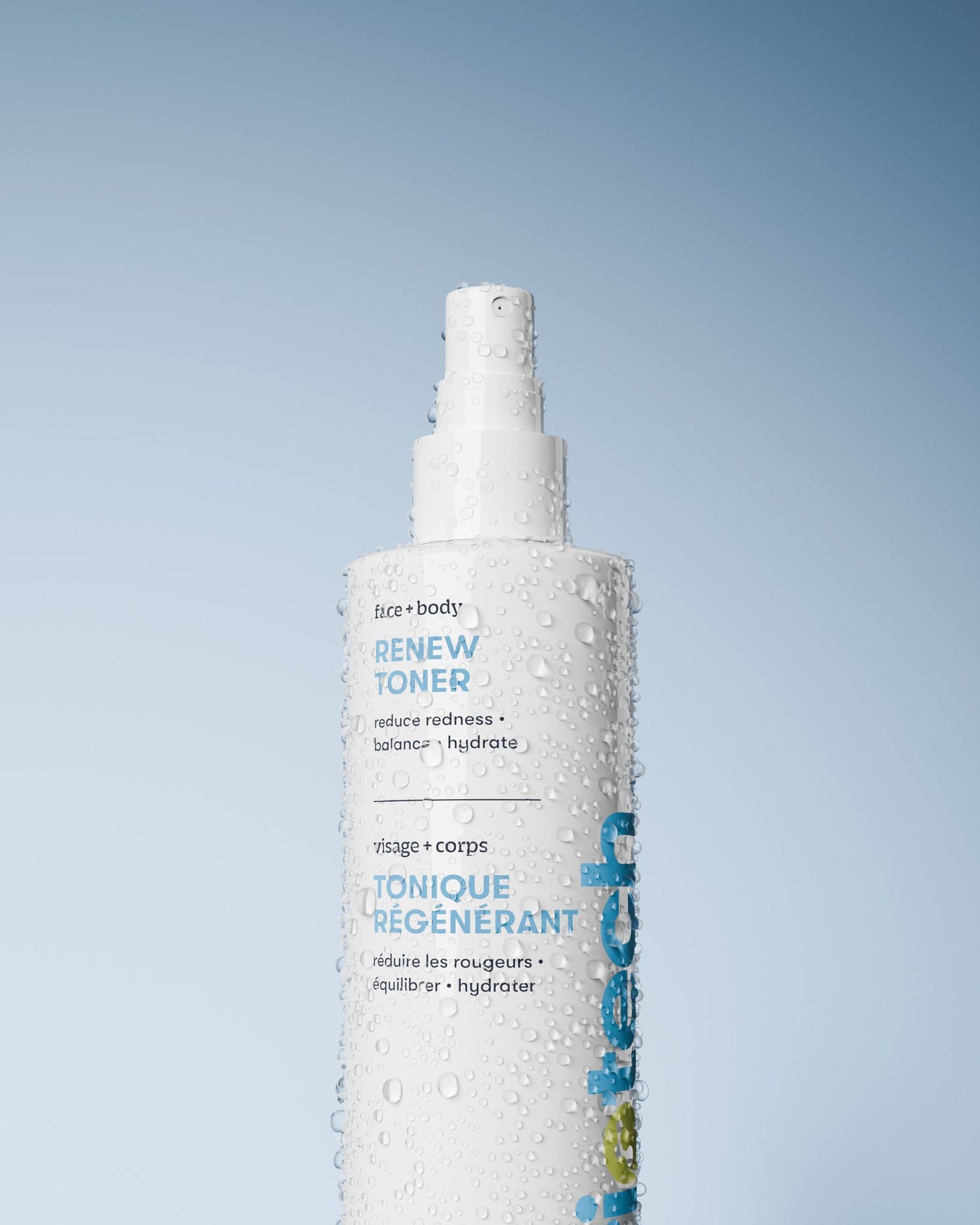 A white bottle of Renew Toner stands upright with water droplets against a pale blue background. The label, in English and French, highlights its ability to calm redness and promote healthy-looking skin.