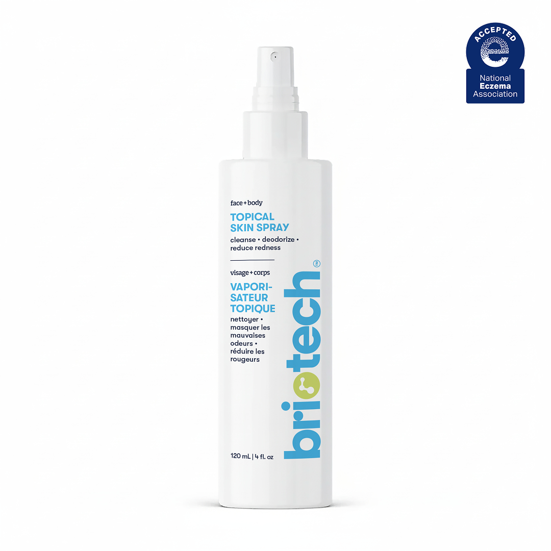 A white 120 ml Topical Skin Spray bottle for face and body, featuring English and French text. The National Eczema Association seal is in the top right corner. Soothes skin irritation.