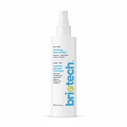 A 120 mL (4 fl. oz) white spray bottle labeled "Topical Skin Spray" features English and French text and contains a face and body skin spray that cleanses, deodorizes, calms irritation, and reduces redness and blemishes.
