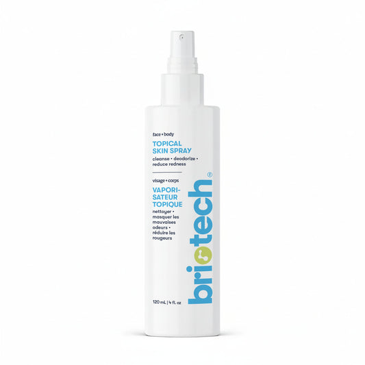 A 120 mL (4 fl. oz) white spray bottle labeled "Topical Skin Spray" features English and French text and contains a face and body skin spray that cleanses, deodorizes, calms irritation, and reduces redness and blemishes.